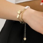 Love letters pendant bracelet with single string of pearls bracelet - Image 2